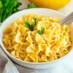 Forkful of creamy cafeteria noodles