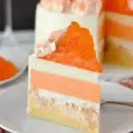 Delicious Orange Creamsicle Ice Cream Cake with creamy orange layers and a graham cracker crust