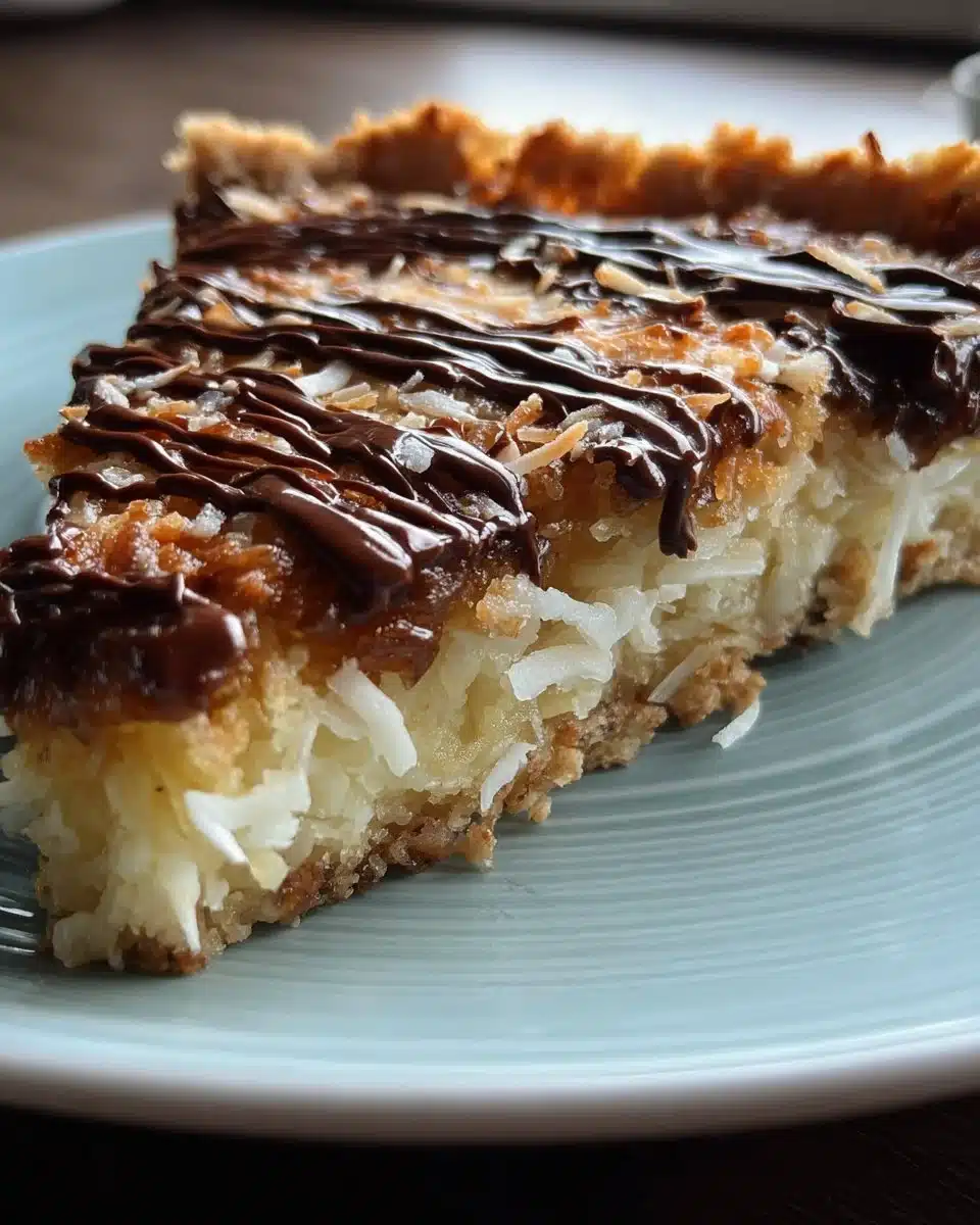 Samoas Cookie Pie topped with chocolate and coconut for a delicious treat