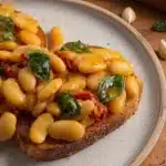 Tuscan Marry Me Butter Beans dish with fresh herbs and spices