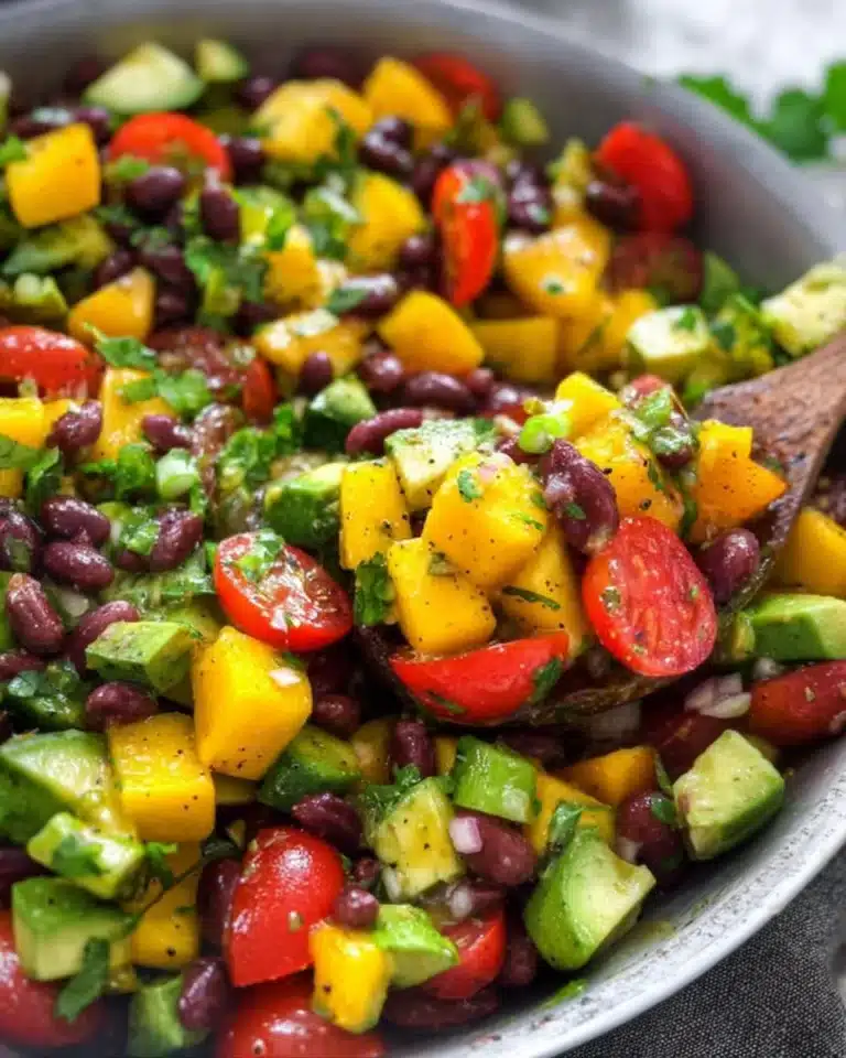 Fresh Black Bean Salad with mango and avocado on a plate