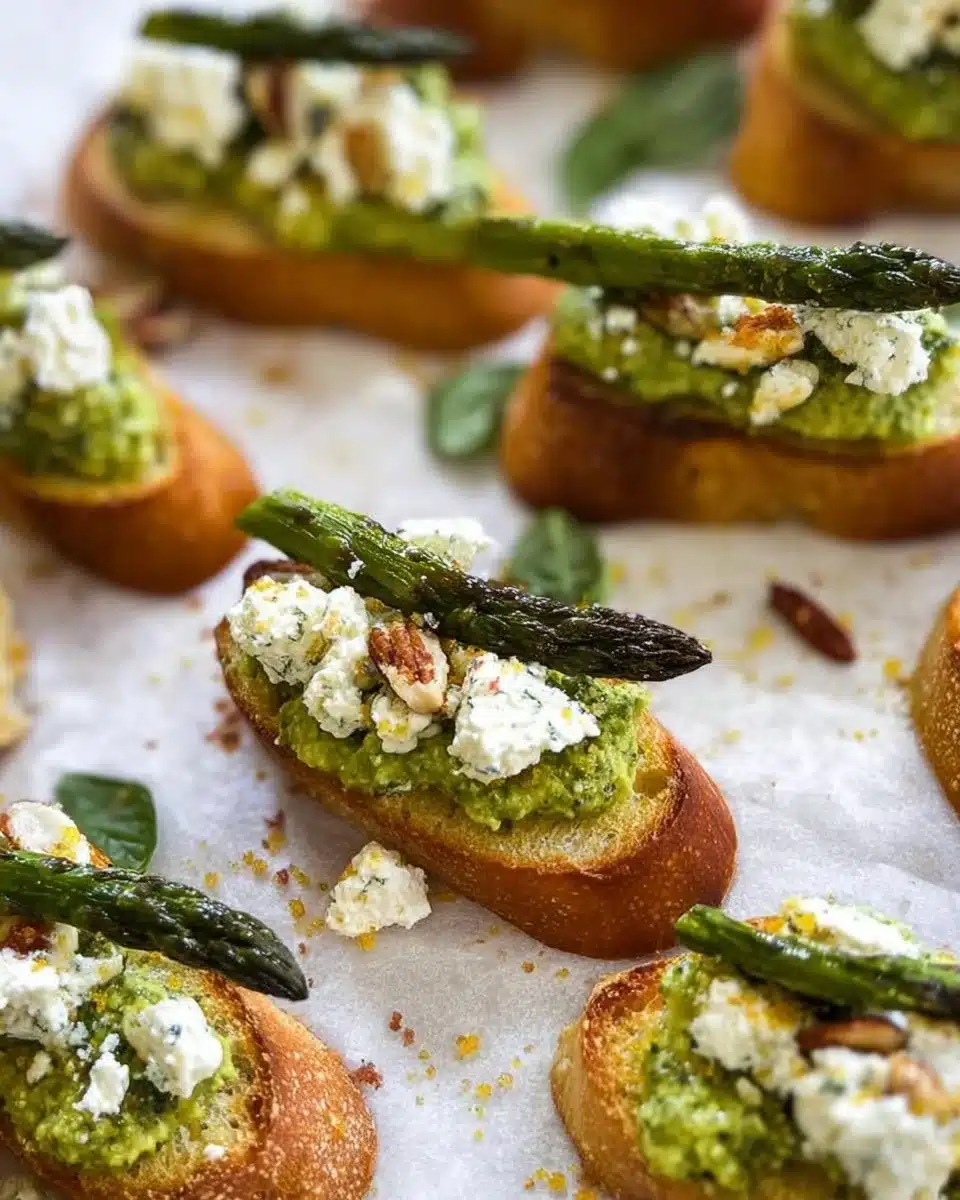Citrus Pesto Crostini topped with creamy goat cheese and herbs