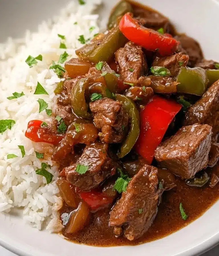 Delicious crock pot pepper steak served with vegetables in a bowl