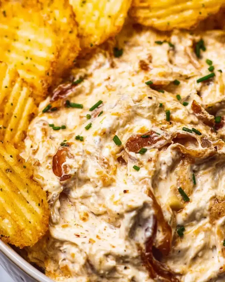 Delicious homemade French Onion Dip served in a bowl with chips