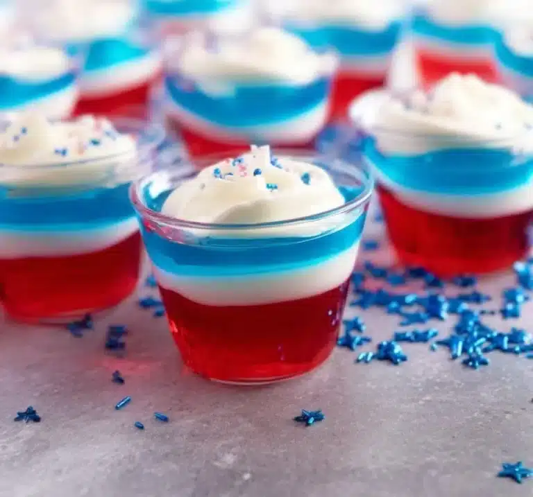 Colorful Jell-O shots served in small cups at a party