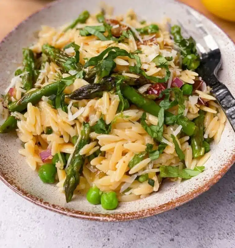 Vibrant Lemon Orzo Salad with fresh vegetables and herbs.