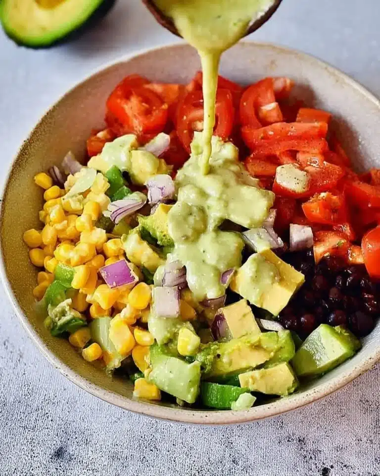 Colorful Mexican avocado salad with fresh ingredients