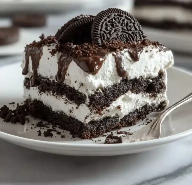 Delicious Oreo Icebox Cake layered with creamy filling and Oreos