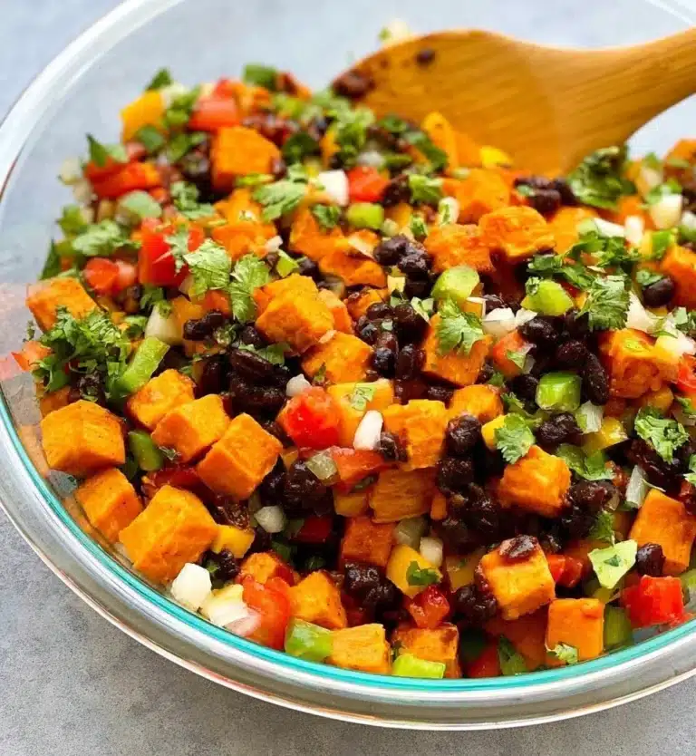 Chipotle sweet potato black bean salad with fresh ingredients served in a bowl