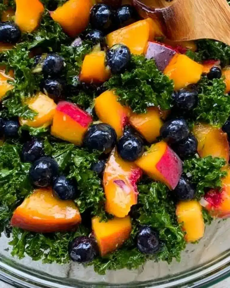 Delicious Peach and Blueberry Kale Salad with fresh ingredients
