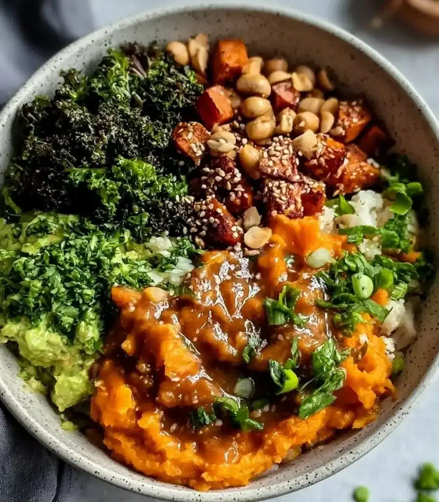 Peanut Sweet Potato Buddha Bowl featuring vibrant veggies and nutritious ingredients