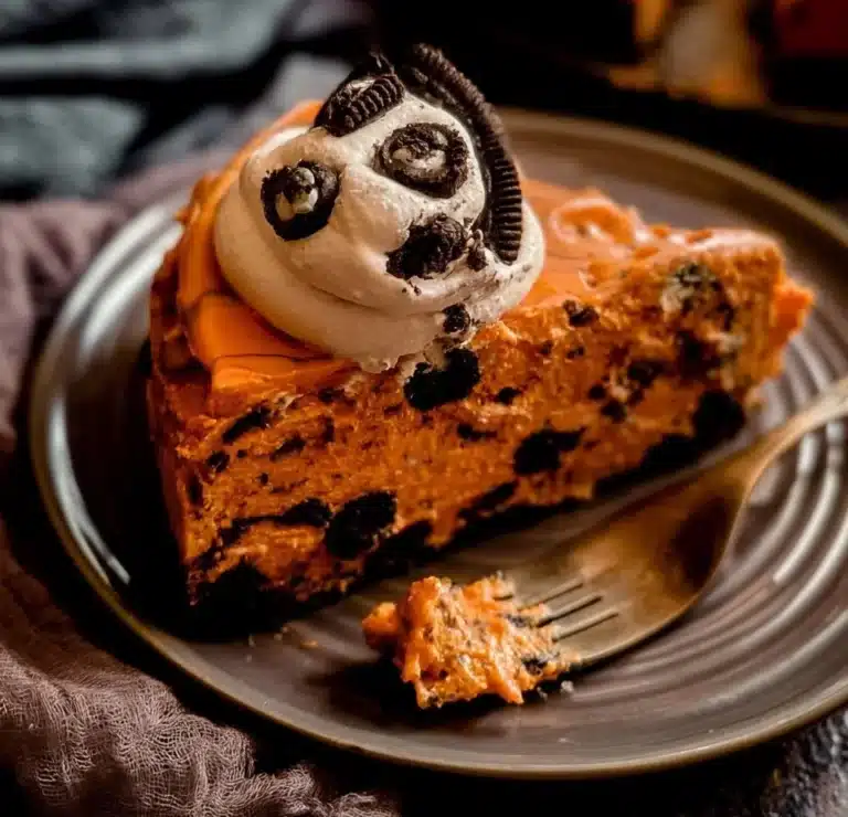 Delicious Cookies and Cream Cheesecake topped with Oreo crumbs