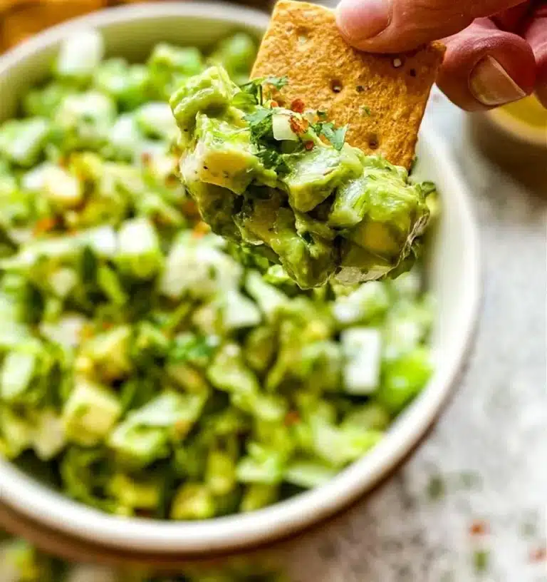 Colorful Green Goddess Salad with fresh greens, avocado, and herbs.