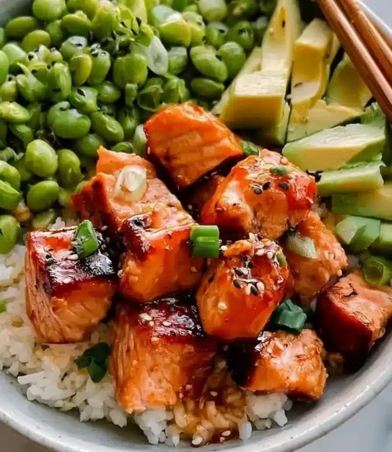 Honey salmon bowl with fresh vegetables and a sweet glaze
